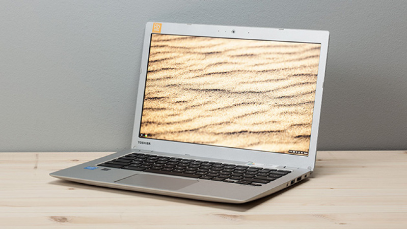 The Toshiba Chromebook 2, an unassuming 13-inch laptop made of light grey plastic. As one might expect, it is running Chrome OS.